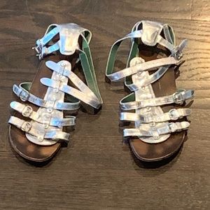 Metallic silver gladiators
